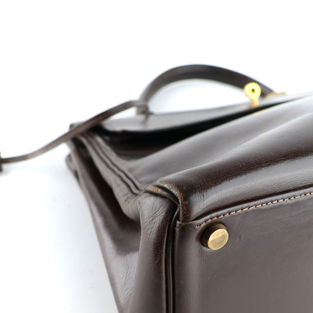 HERMÈS - Sac à main Kelly 32 en cuir box chocolat vintage