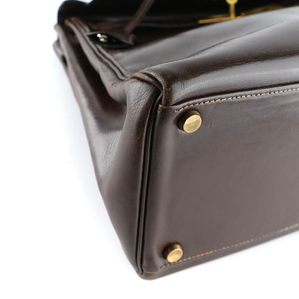 HERMÈS - Sac à main Kelly 32 en cuir box chocolat vintage