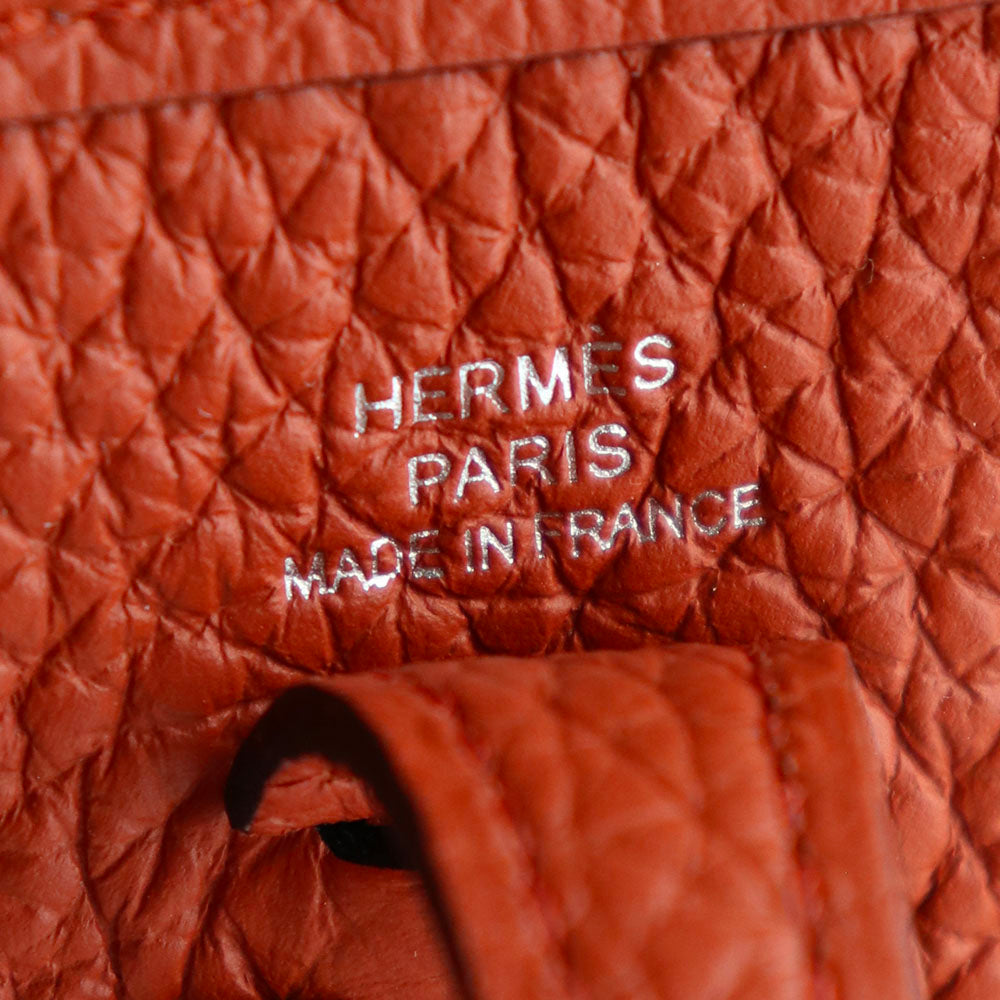 HERMÈS - Sac à bandoulière Evelyne mini en cuir Clémence orange doux