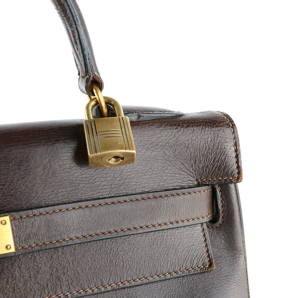 HERMÈS - Sac à main Kelly 32 en cuir box chocolat vintage