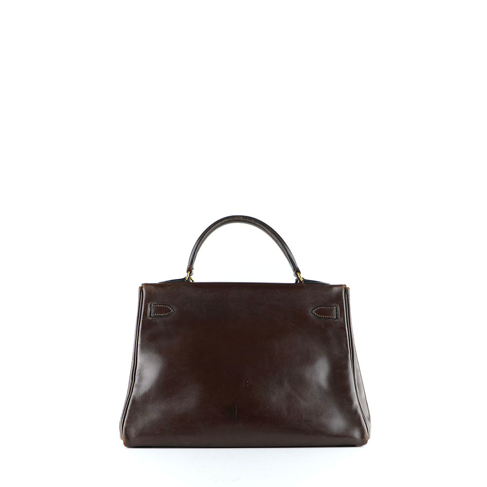 HERMÈS - Sac à main Kelly 32 en cuir box chocolat vintage