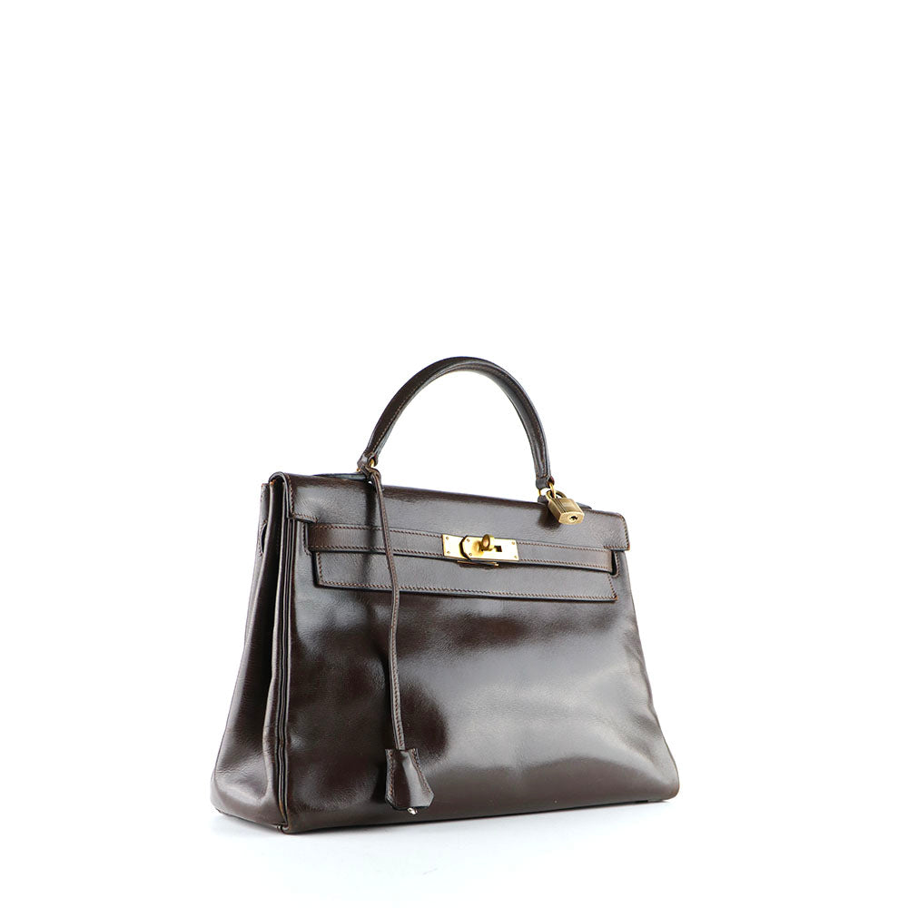 HERMÈS - Sac à main Kelly 32 en cuir box chocolat vintage
