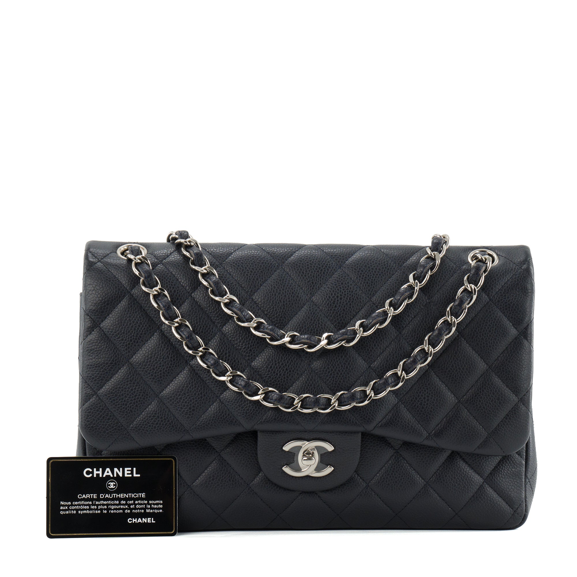 CHANEL - Sac à bandoulière Classique/Timeless Jumbo Chanel en cuir caviar bleu marine