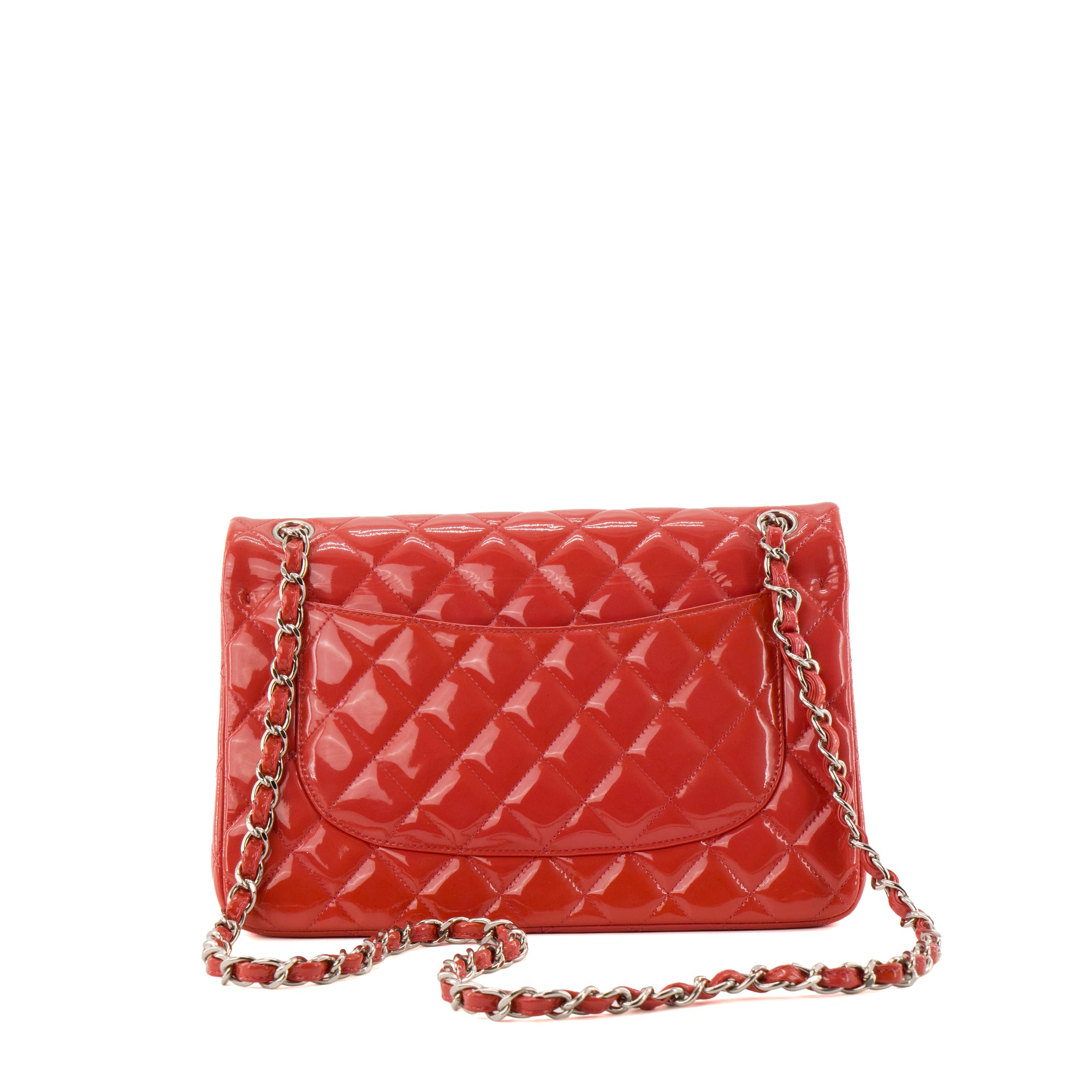 CHANEL - Sac à bandoulière Classique/Timeless Jumbo Chanel en cuir verni rose