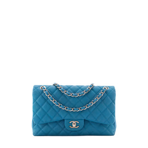 CHANEL - Sac à main Classique/Timeless Jumbo Chanel en cuir caviar bleu