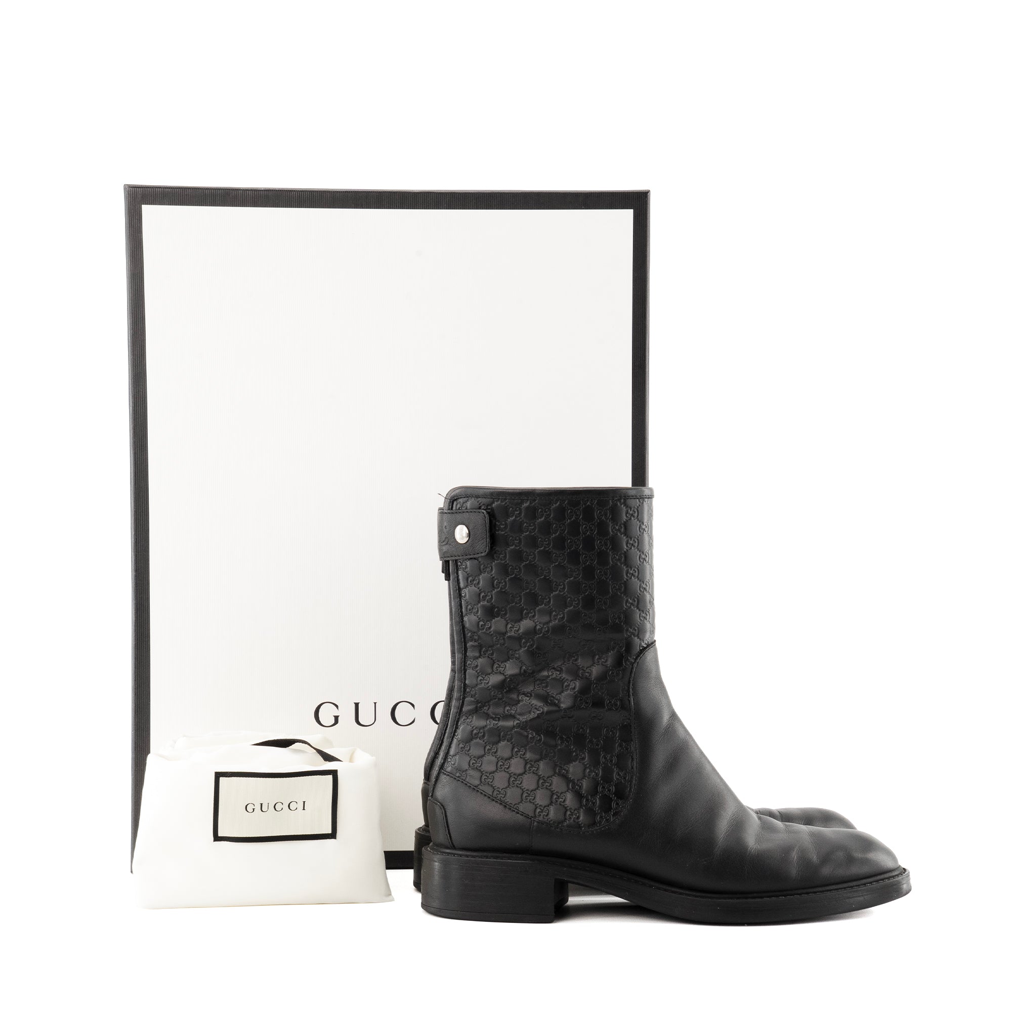 GUCCI - Bottines Gucci en cuir embossé monogrammé noir (T38.5)