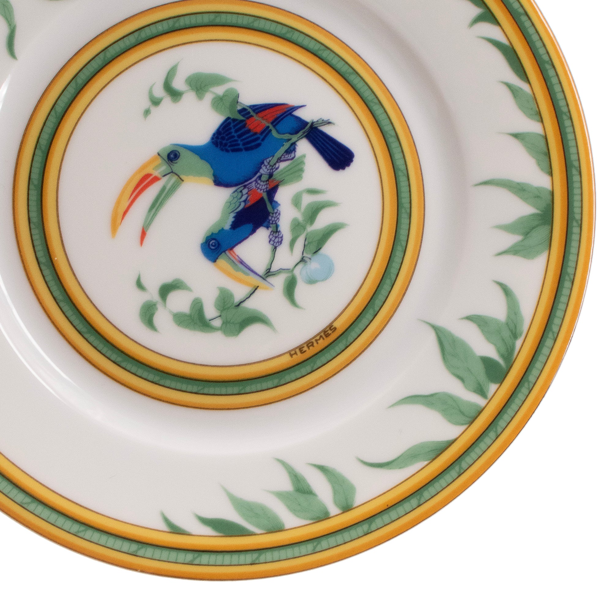 HERMÈS - Lot de six assiettes à pain Toucans Hermès en porcelaine multicolore