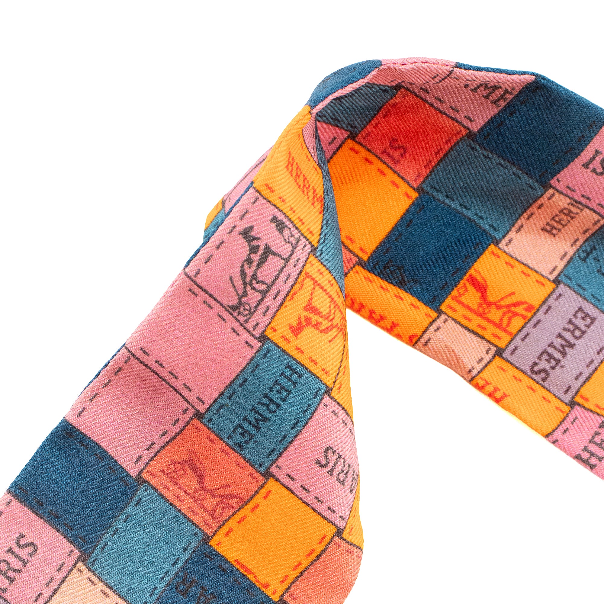 HERMÈS - Twilly Bolduc Hermès en soie multicolore