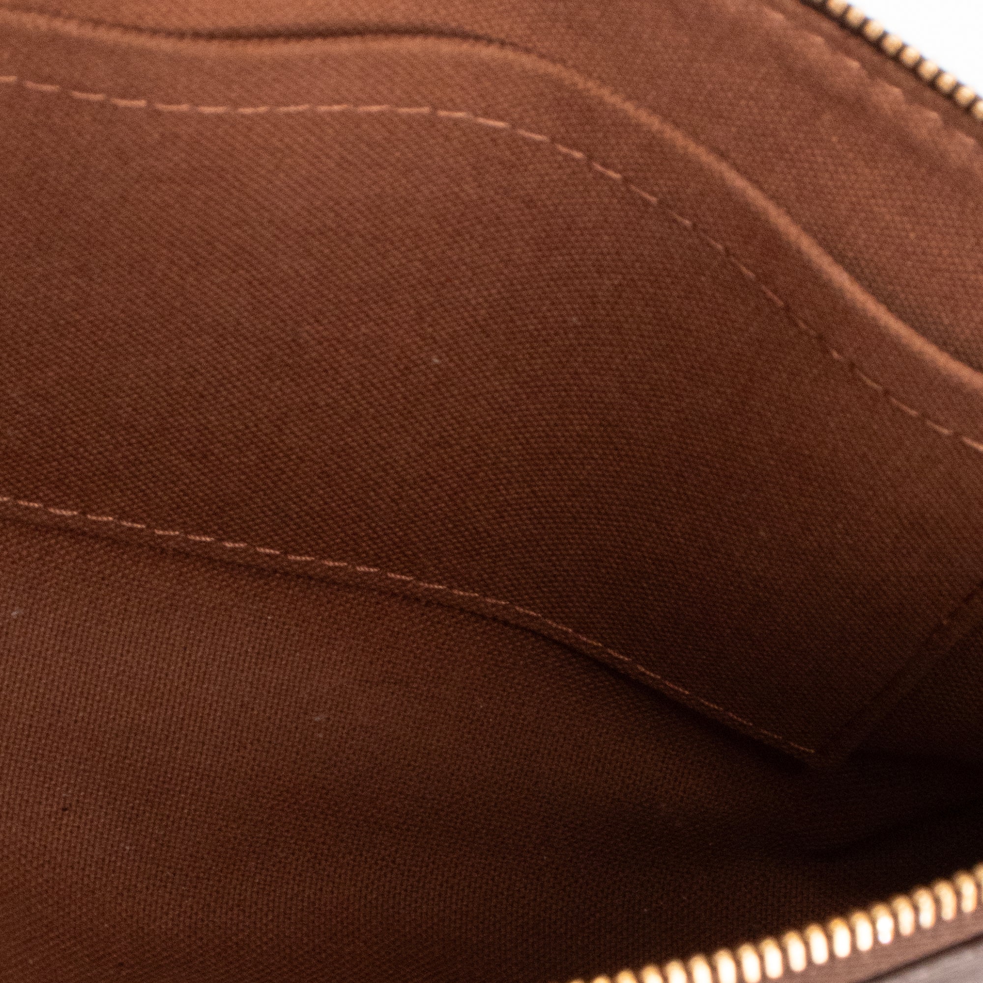 LOUIS VUITTON - Pochette Accessoires Louis Vuitton en toile enduite monogrammée