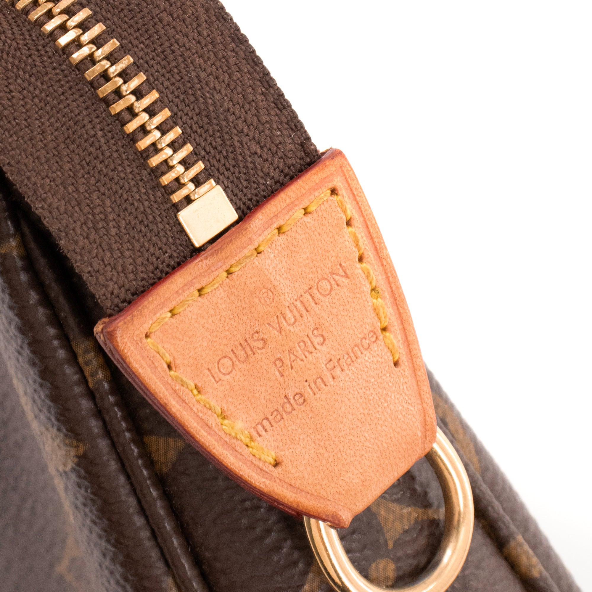 LOUIS VUITTON - Pochette Accessoires Louis Vuitton en toile enduite monogrammée