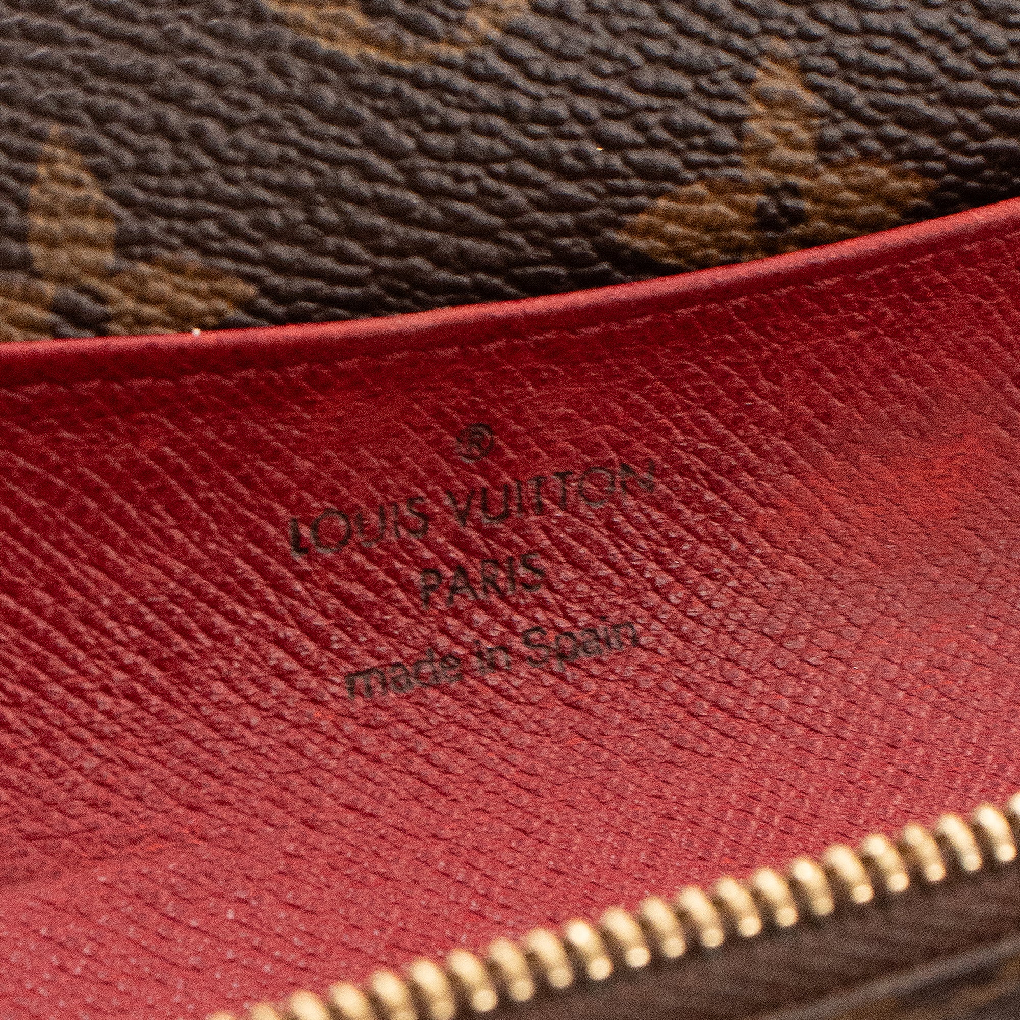 LOUIS VUITTON - Portefeuille Emilie Louis Vuitton en toile enduite monogrammée