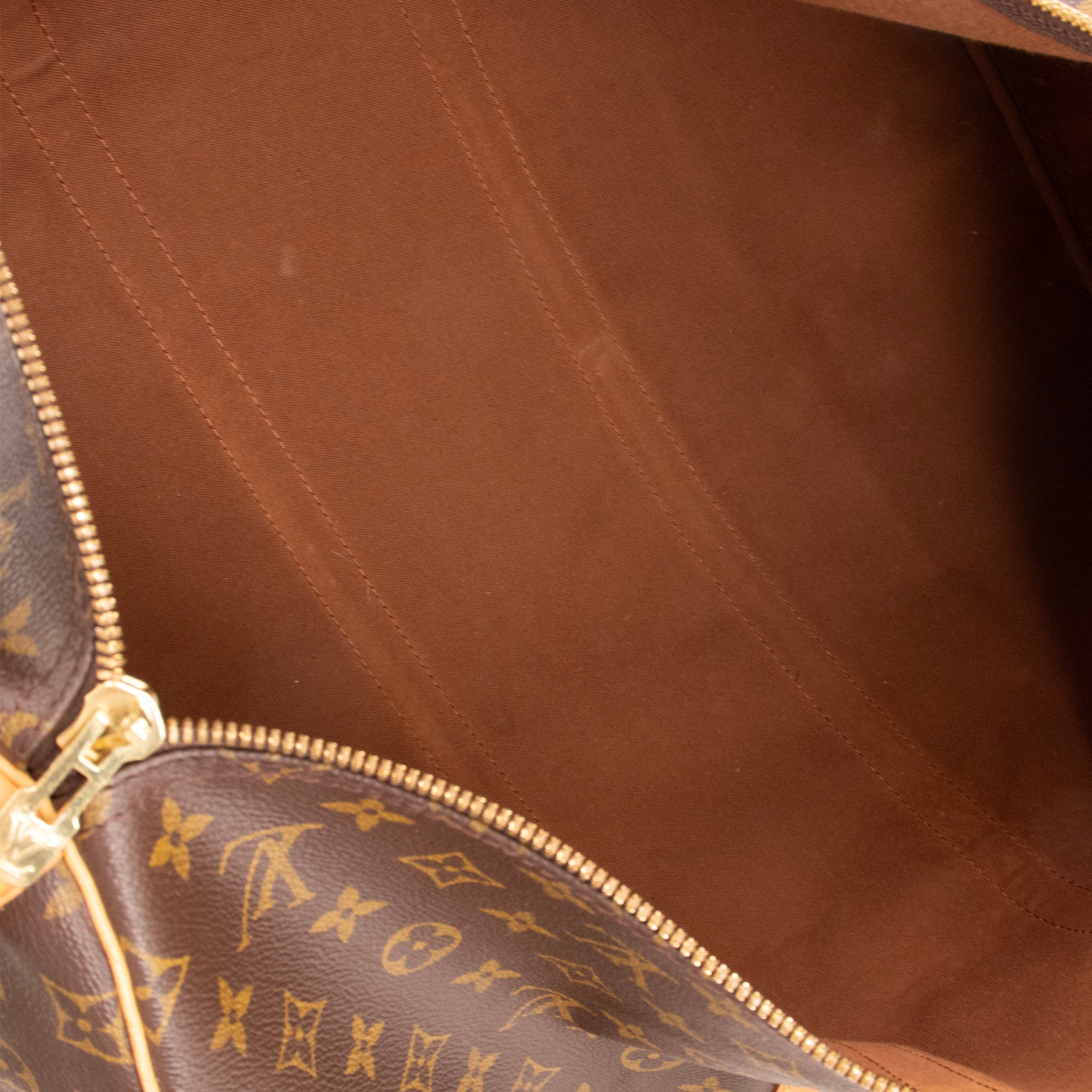 LOUIS VUITTON - Sac de voyage Keepall 55 Louis Vuitton en toile enduite monogrammée vintage
