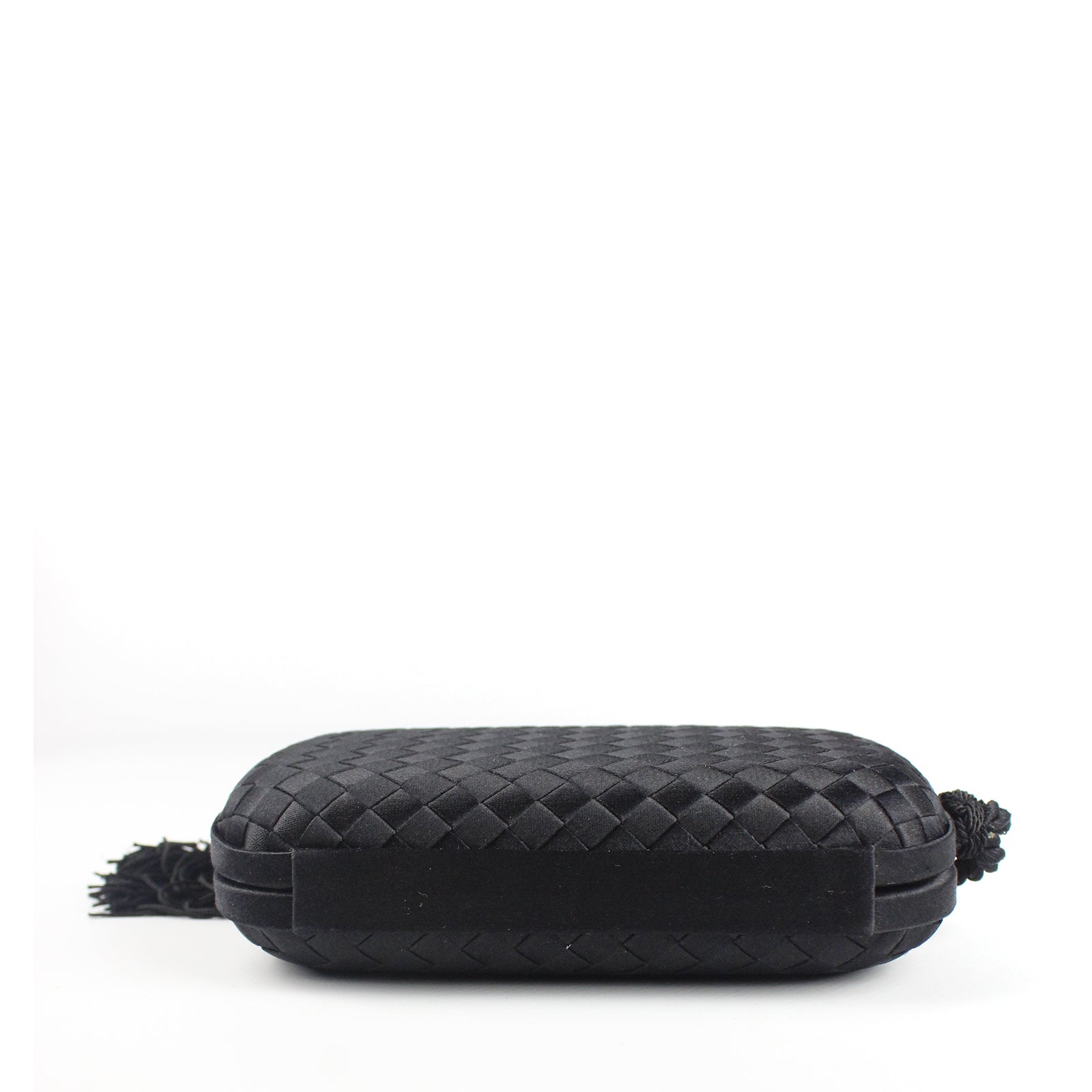 Minaudière Knot en soie avec pompon