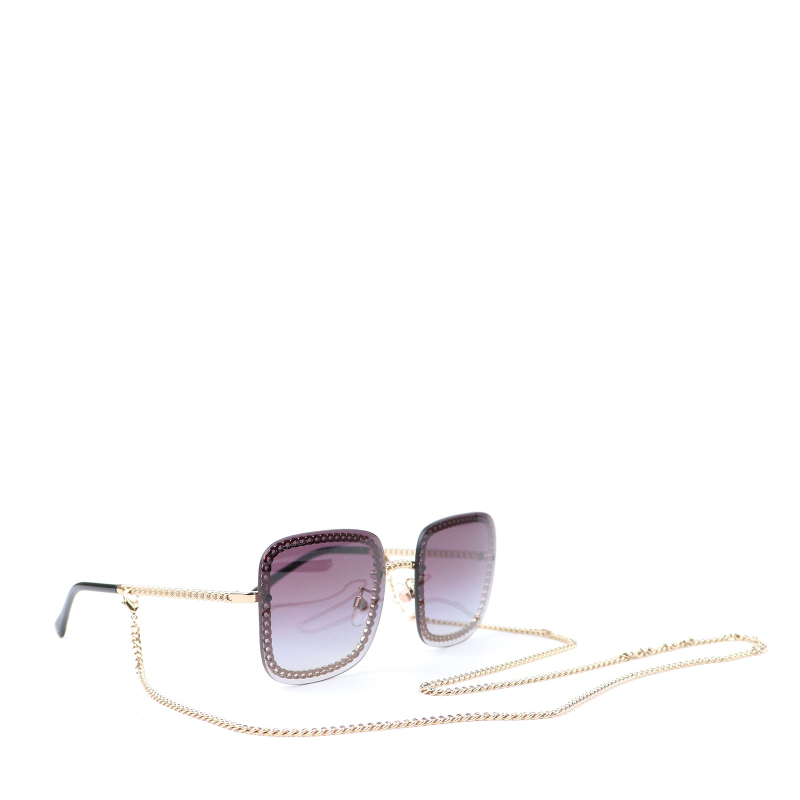 CHANEL - Lunettes de soleil avec chaîne