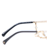 CHANEL - Lunettes de soleil avec chaîne