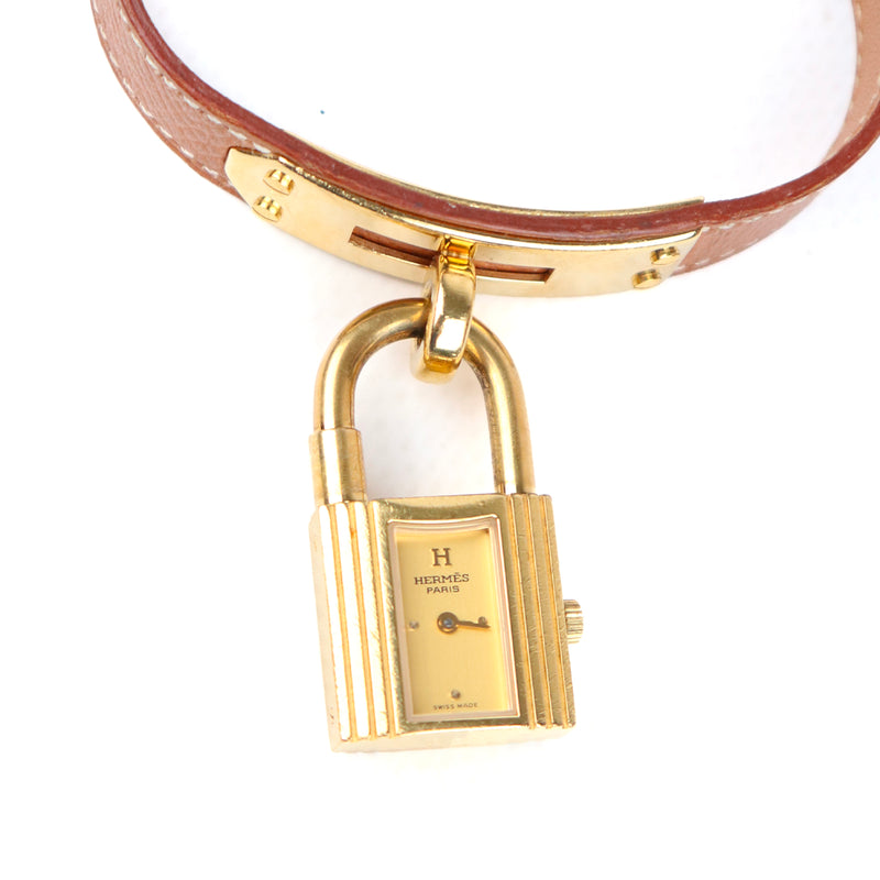 HERMÈS - Montre Kelly en cuir gold