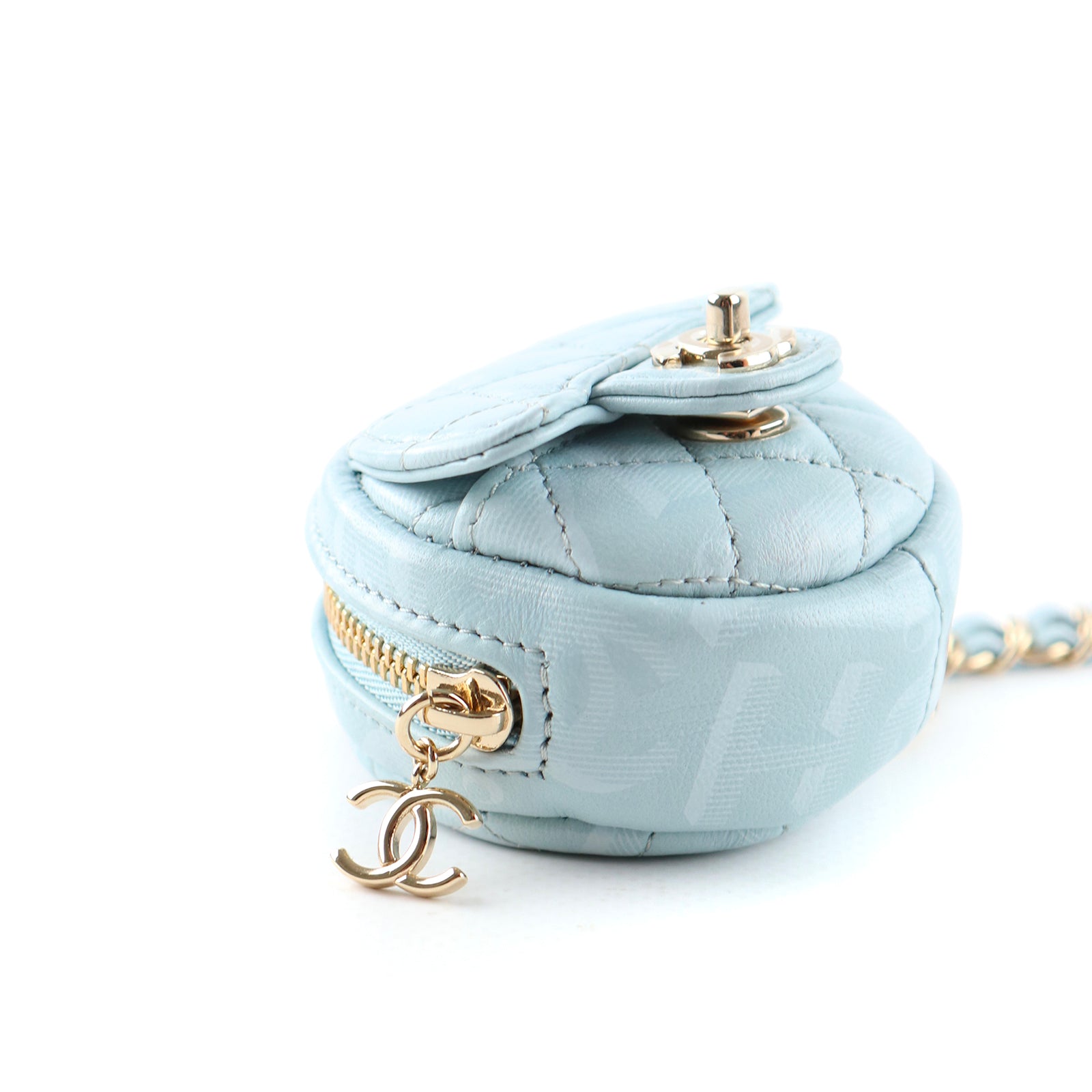 CHANEL - Micro sac rond en cuir matelassé