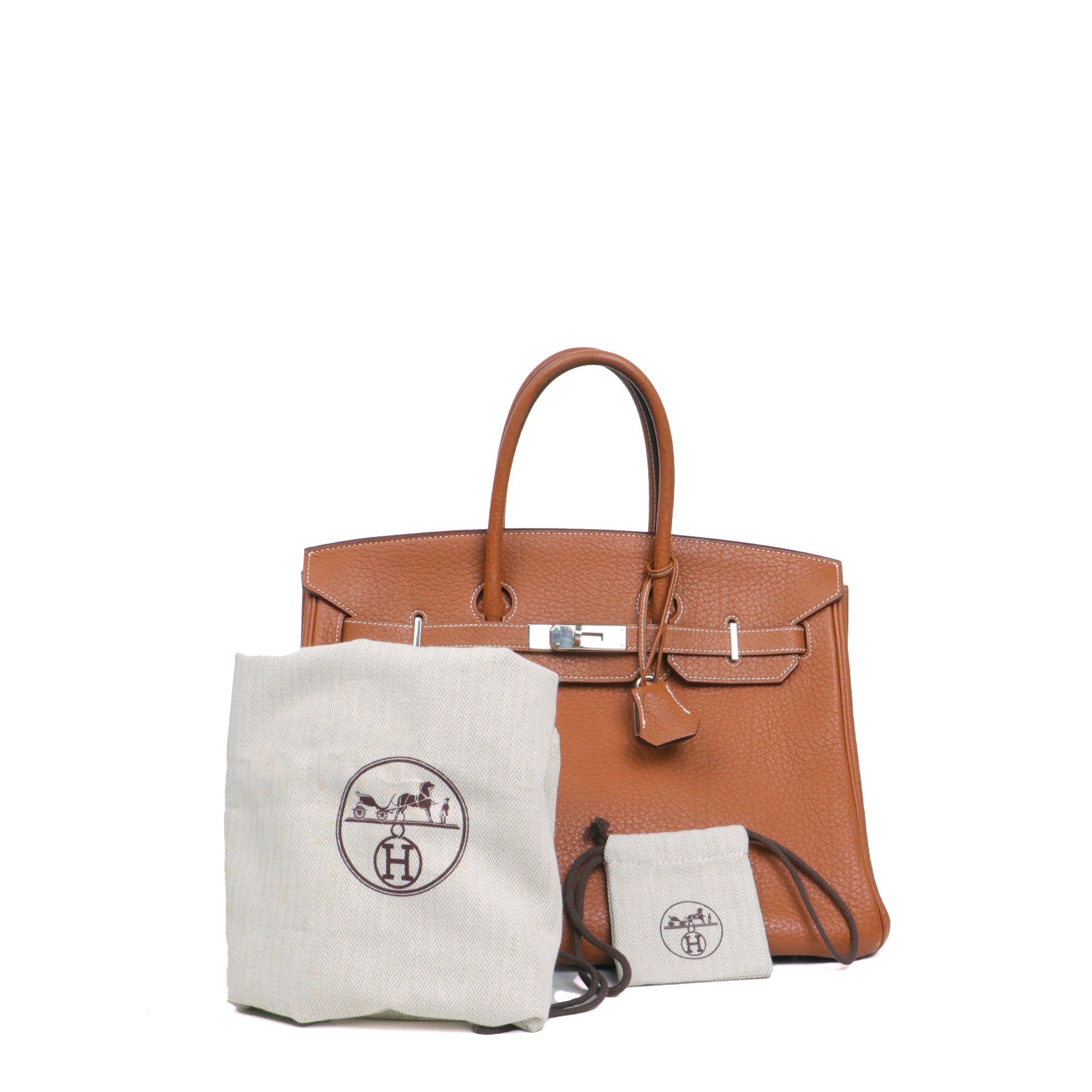 HERMÈS - Sac à main Birkin 35 Hermès en cuir clémence gold