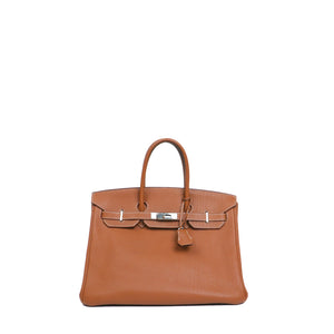 HERMÈS - Sac à main Birkin 35 Hermès en cuir clémence gold