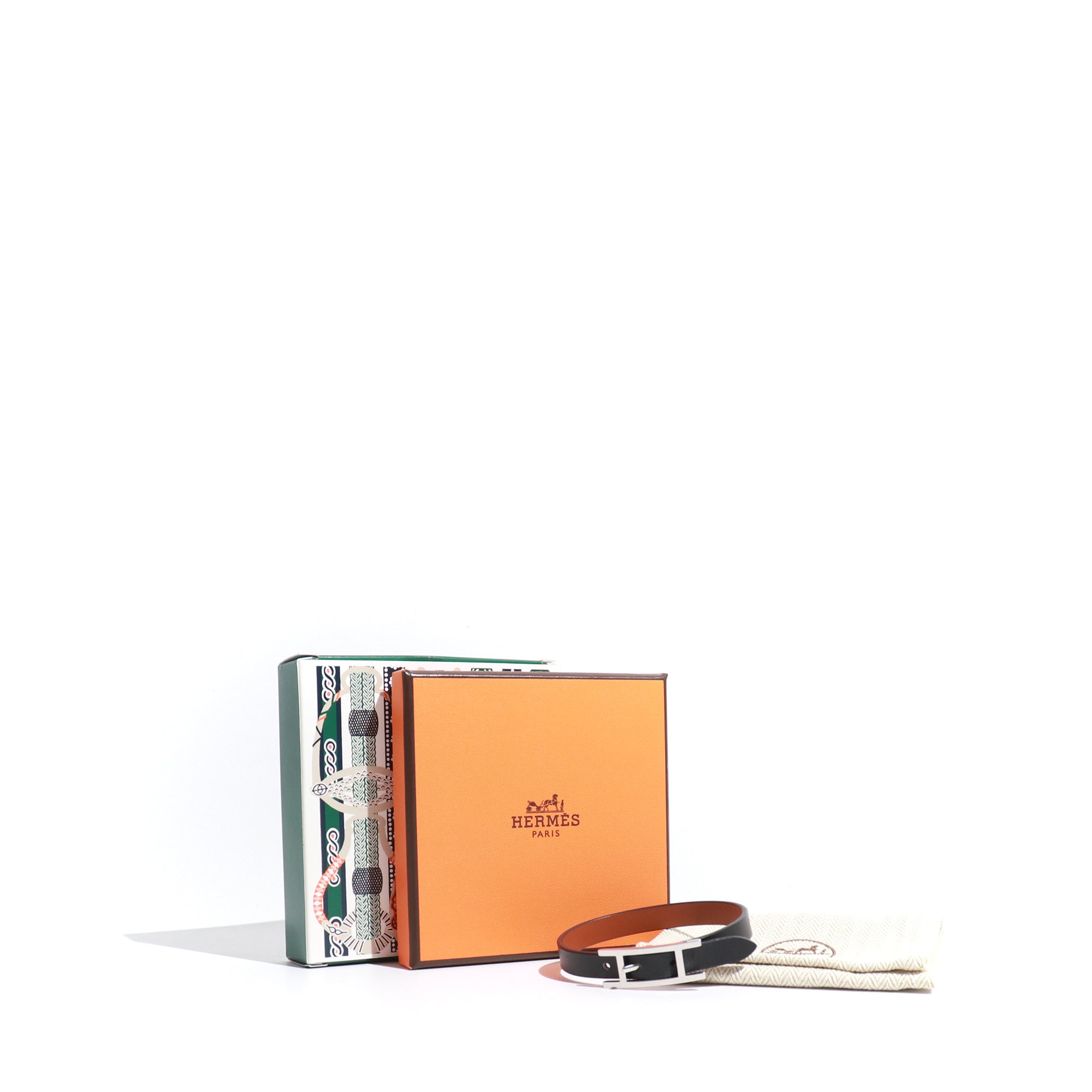 HERMÈS - Reversible single tour Behapi bracelet in black and brown leather