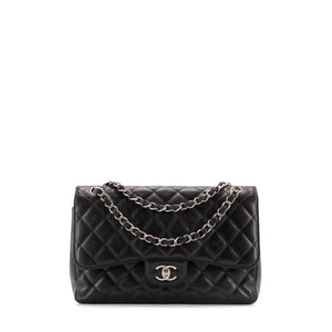CHANEL - Sac à bandoulière Classique/Timeless Jumbo Chanel en cuir grainé noir