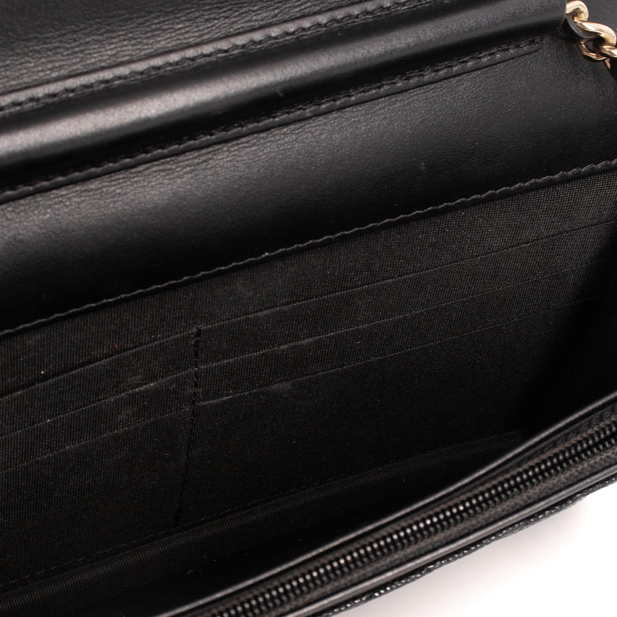CHANEL - Sac à bandoulière Wallet On Chain Filigree Chanel en cuir caviar noir