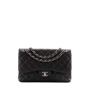 CHANEL - Sac à main Classique/Timeless Jumbo Chanel en cuir caviar noir