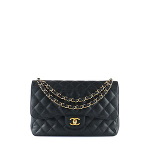 CHANEL - Sac à bandoulière Classique / Timeless Jumbo double flap en cuir caviar noir