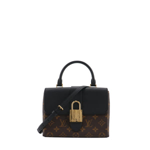 LOUIS VUITTON - Louis Vuitton Locky BB shoulder bag in monogrammed canvas and black leather