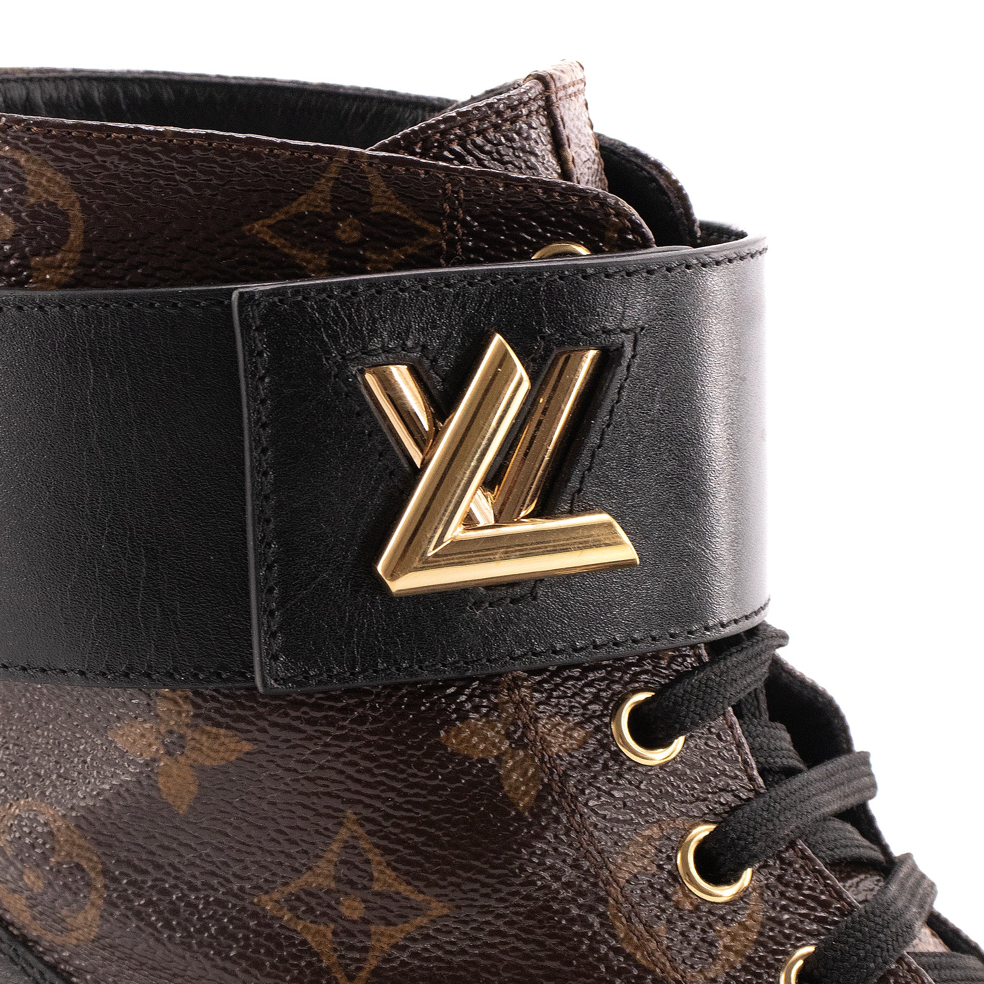 LOUIS VUITTON - Louis Vuitton Wonderland ankle boots in leather and monogrammed canvas (Size 38)