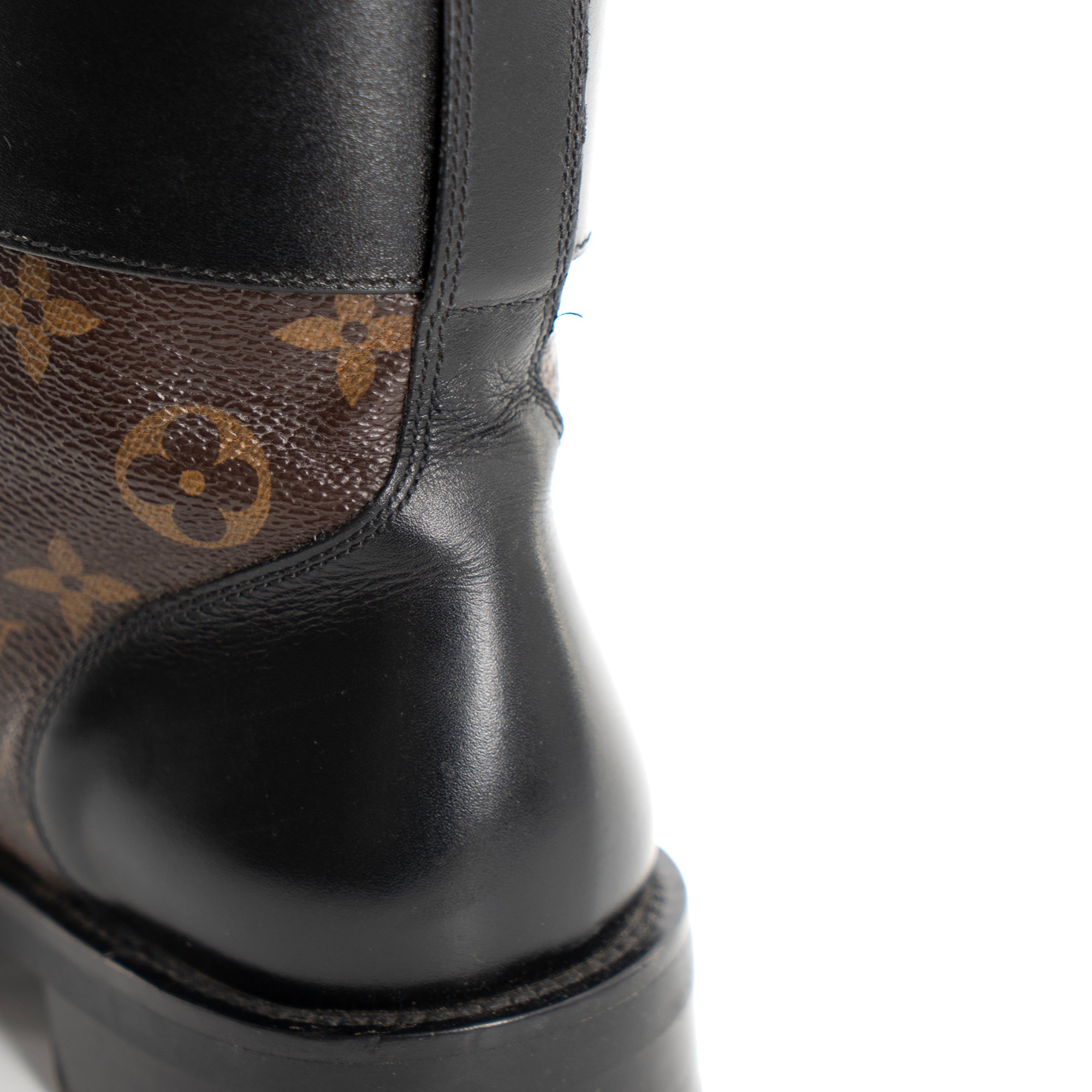 LOUIS VUITTON - Louis Vuitton Wonderland ankle boots in leather and monogrammed canvas (Size 38)
