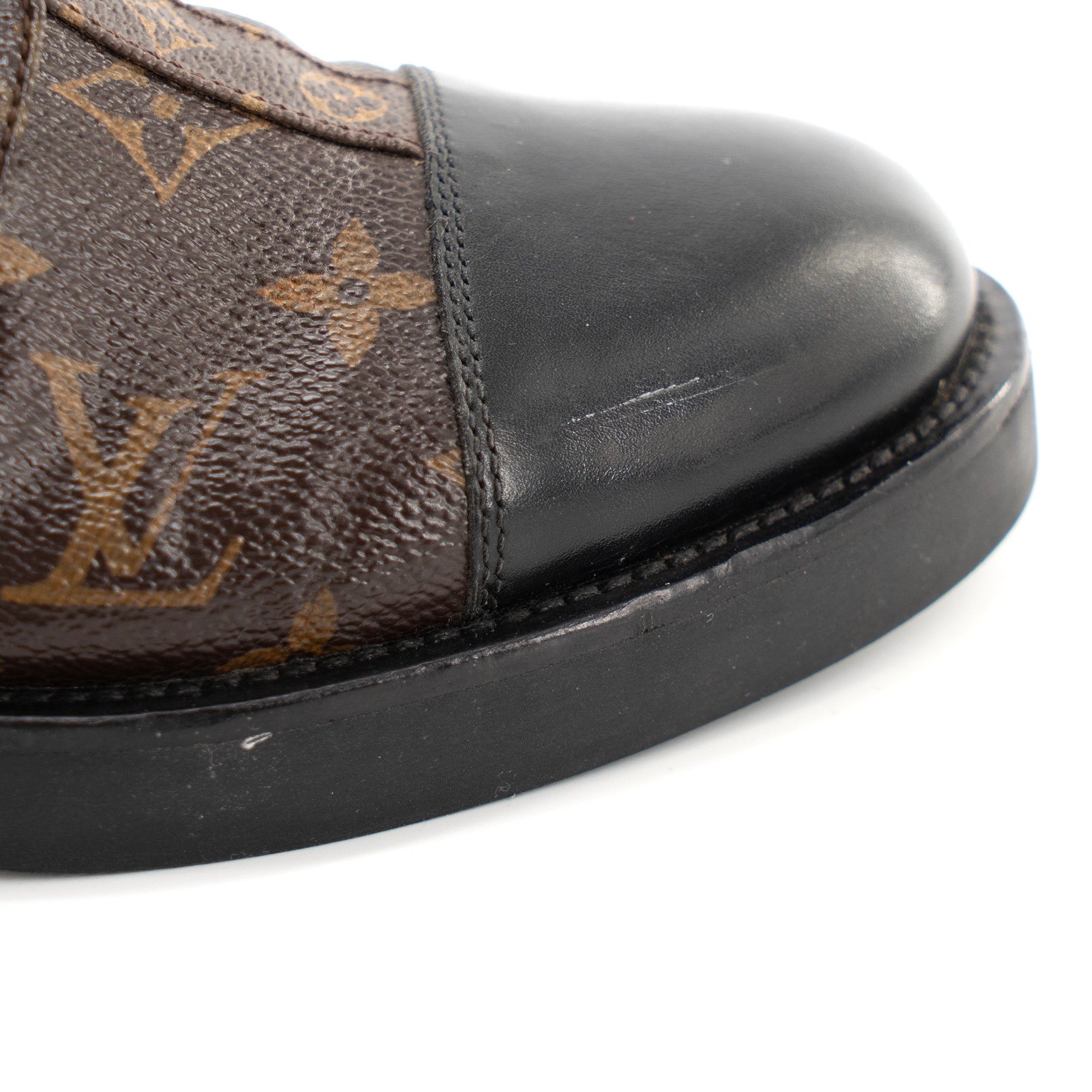 LOUIS VUITTON - Louis Vuitton Wonderland ankle boots in leather and monogrammed canvas (Size 38)