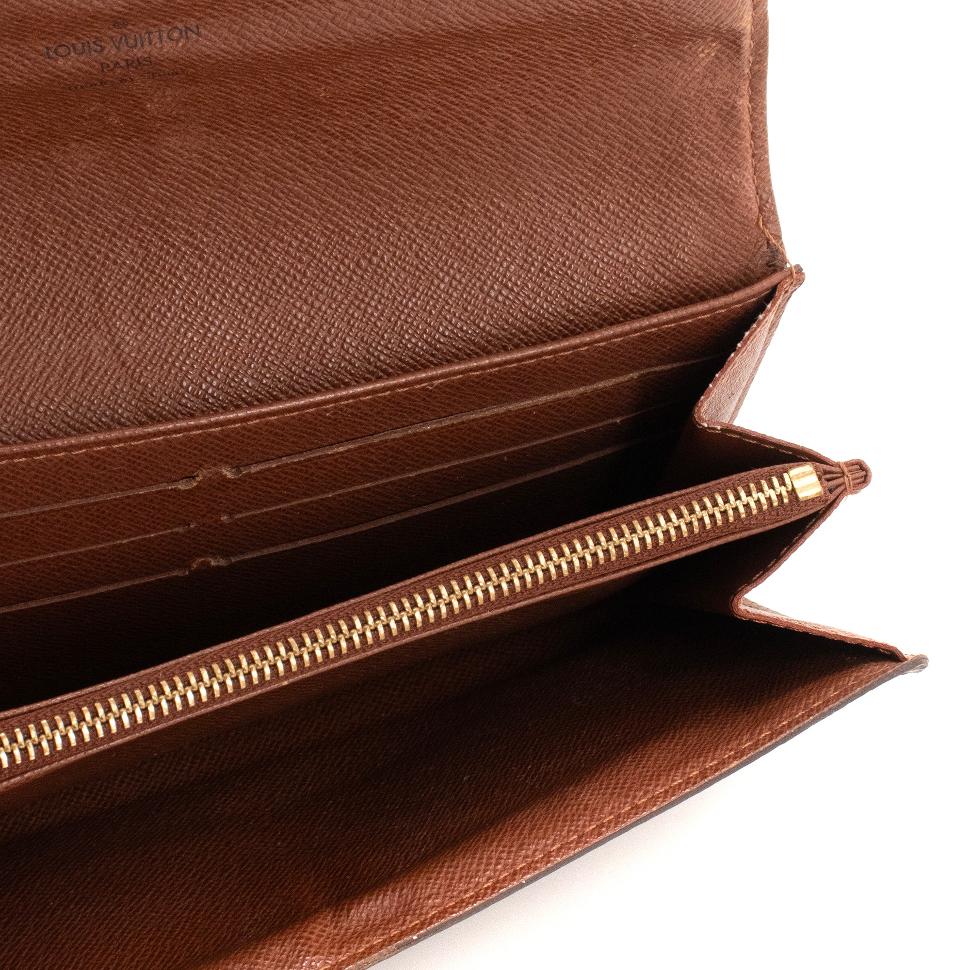 LOUIS VUITTON - Louis Vuitton Sarah wallet in monogrammed coated canvas