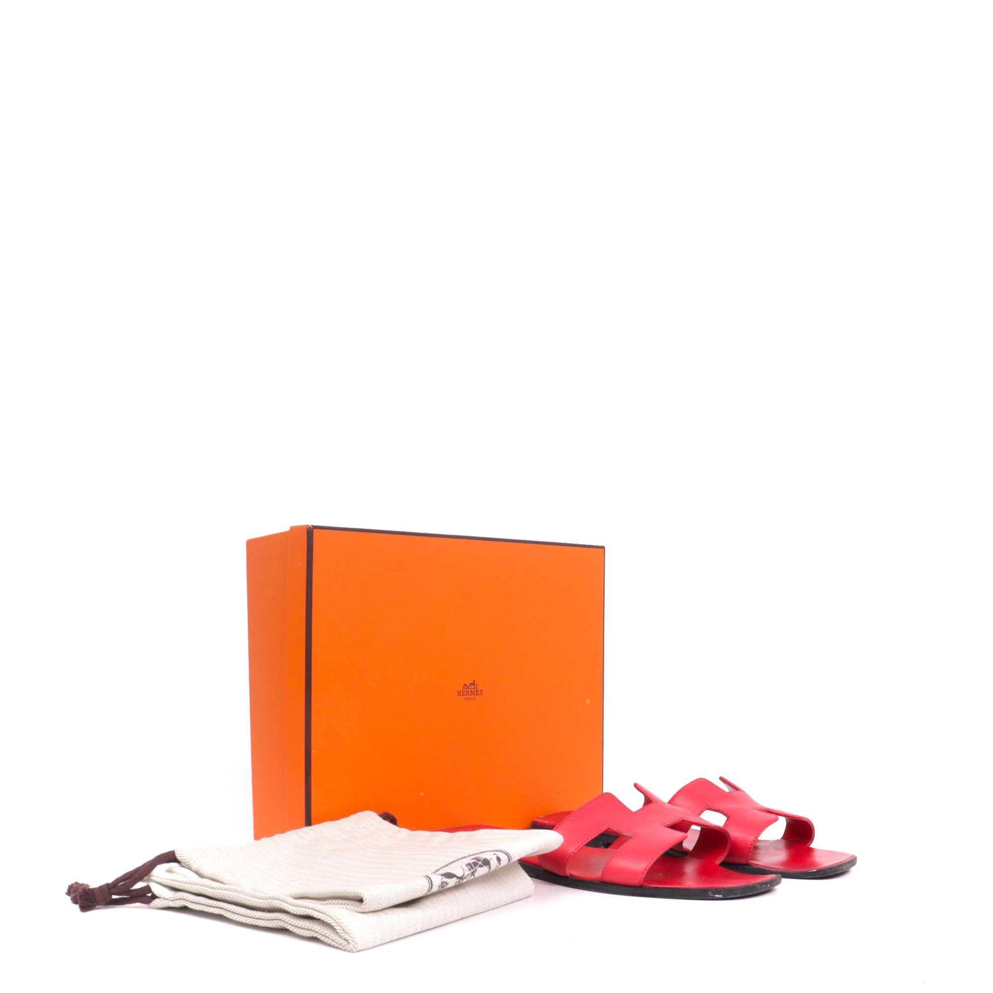 HERMÈS - Sandales Oran Hermès en cuir rouge (T40.5)