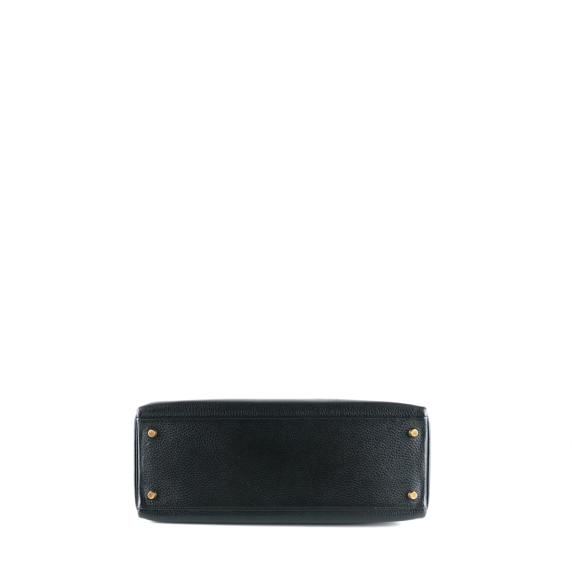 HERMÈS - Sac à main Kelly 35 en cuir togo bicolore noir et gold