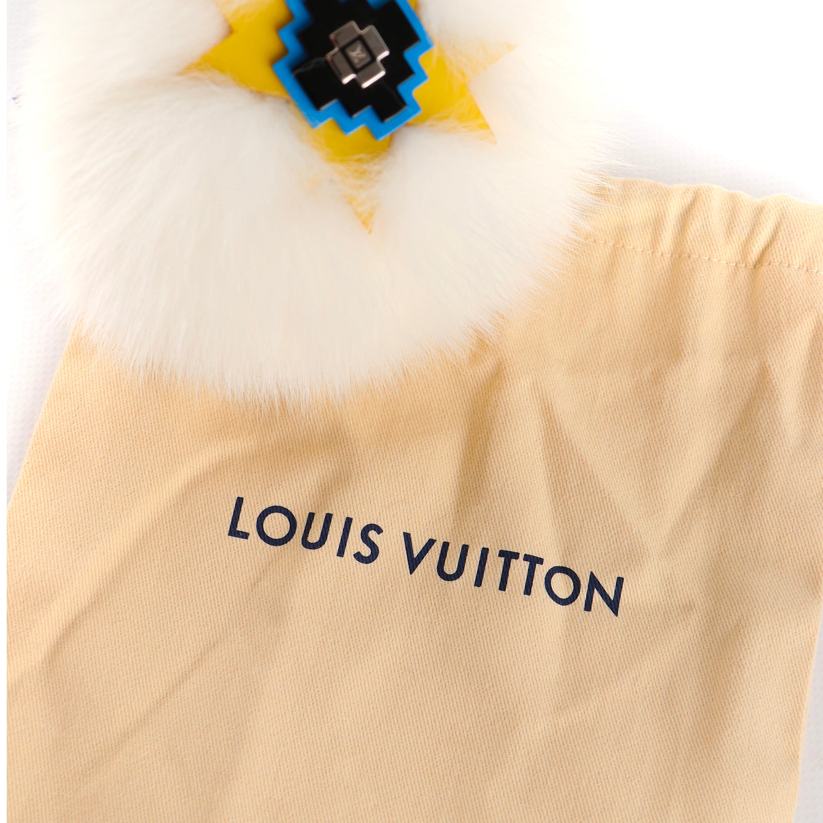 LOUIS VUITTON - Bijoux de sac en cuir et fourrure