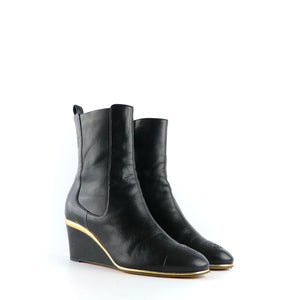 CHANEL - Bottines compensées en cuir noir (T37)