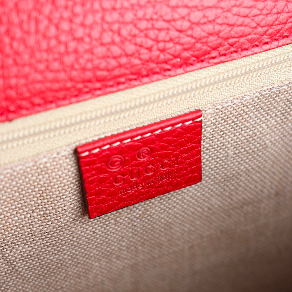GUCCI - Sac à bandoulière Interlocking en cuir grainé rouge