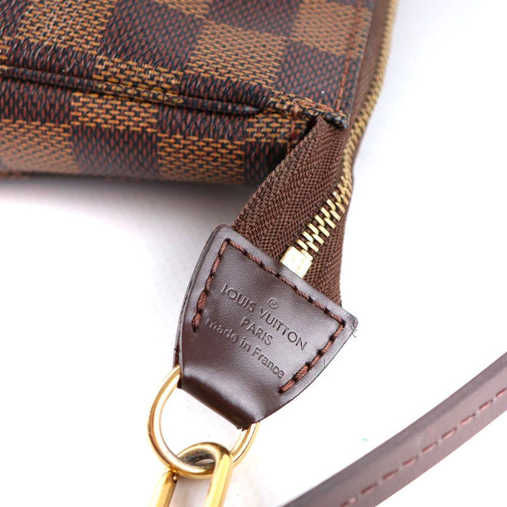 LOUIS VUITTON - Pochette Accessoires NM en toile enduite damier ébène