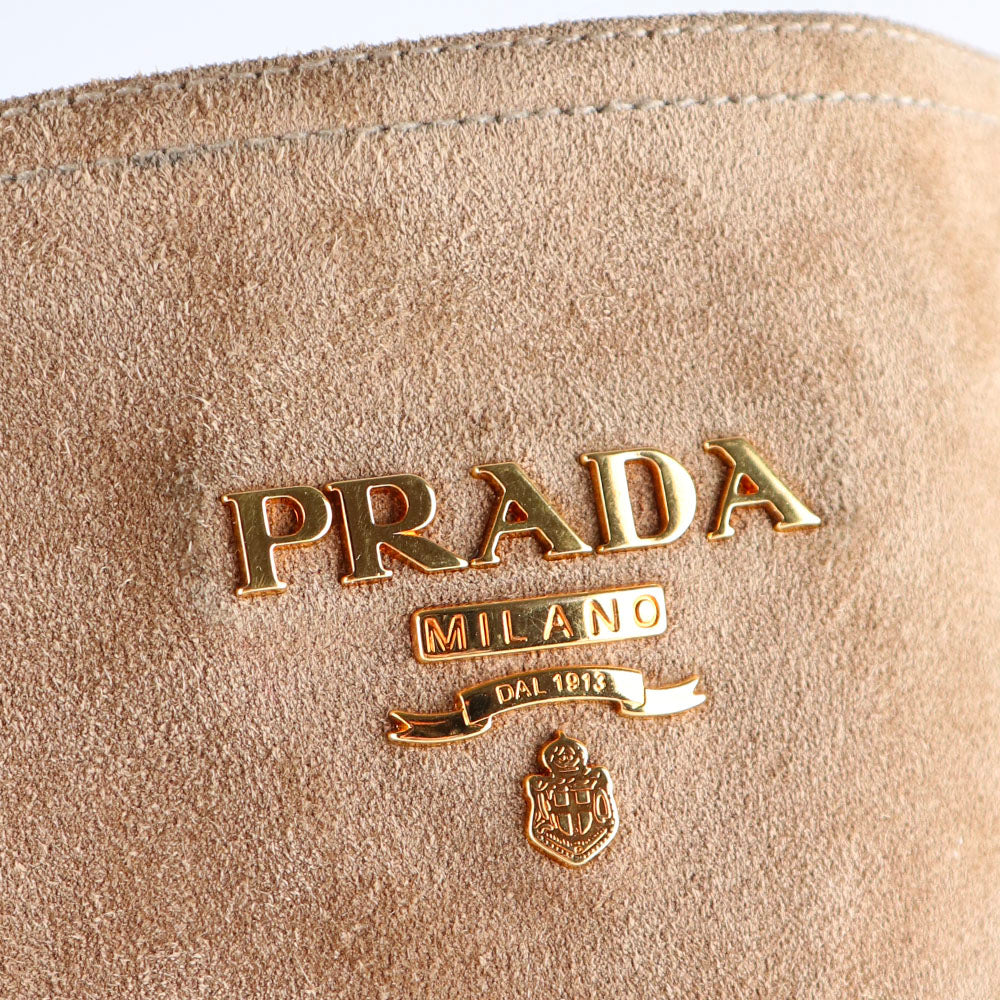 PRADA - Bottes perforées en daim marron (T38,5)