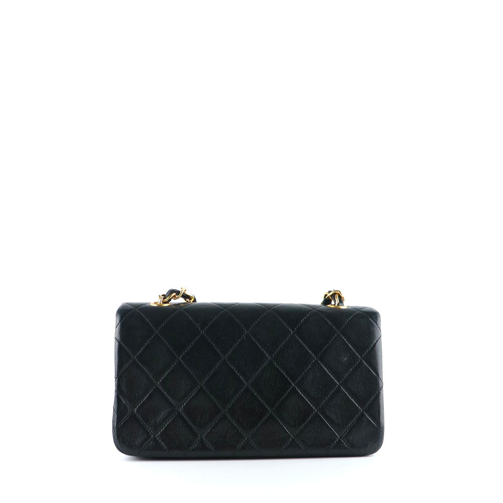 CHANEL - Sac à bandoulière Mademoiselle vintage en cuir matelassé