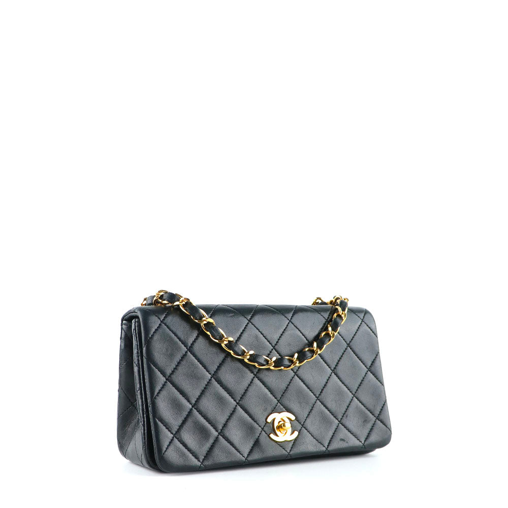 CHANEL - Sac à bandoulière Mademoiselle vintage en cuir matelassé