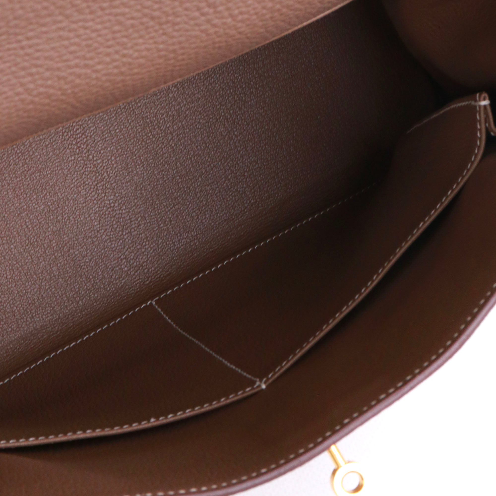 HERMÈS - Sac à main Kelly 32 Hermès en cuir togo étoupe retourné