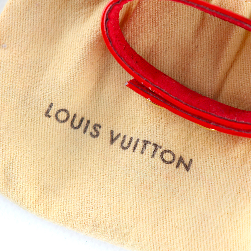 LOUIS VUITTON - Bracelet en cuir verni empreinte rouge
