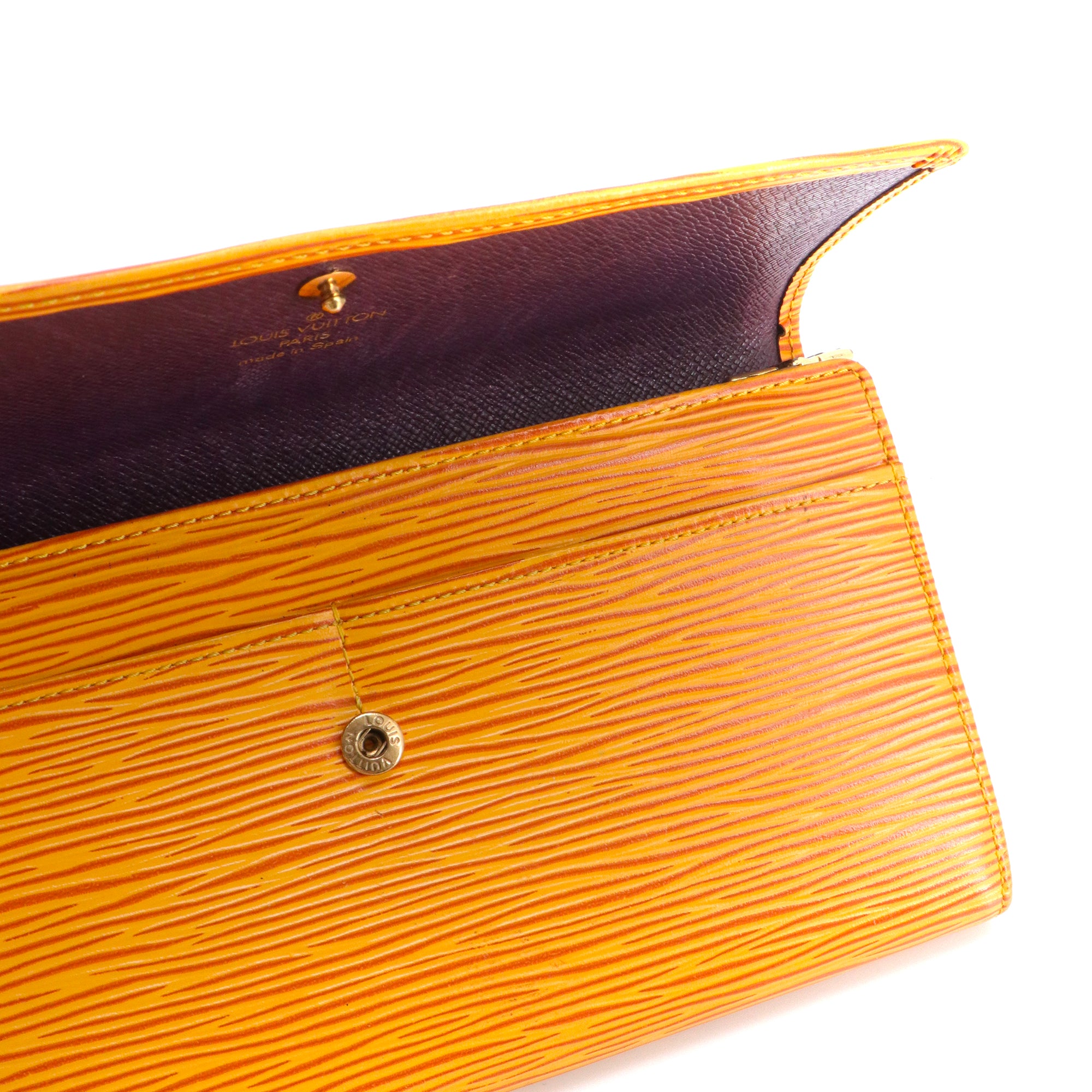 LOUIS VUITTON - Portefeuille International Louis Vuitton en cuir épi jaune