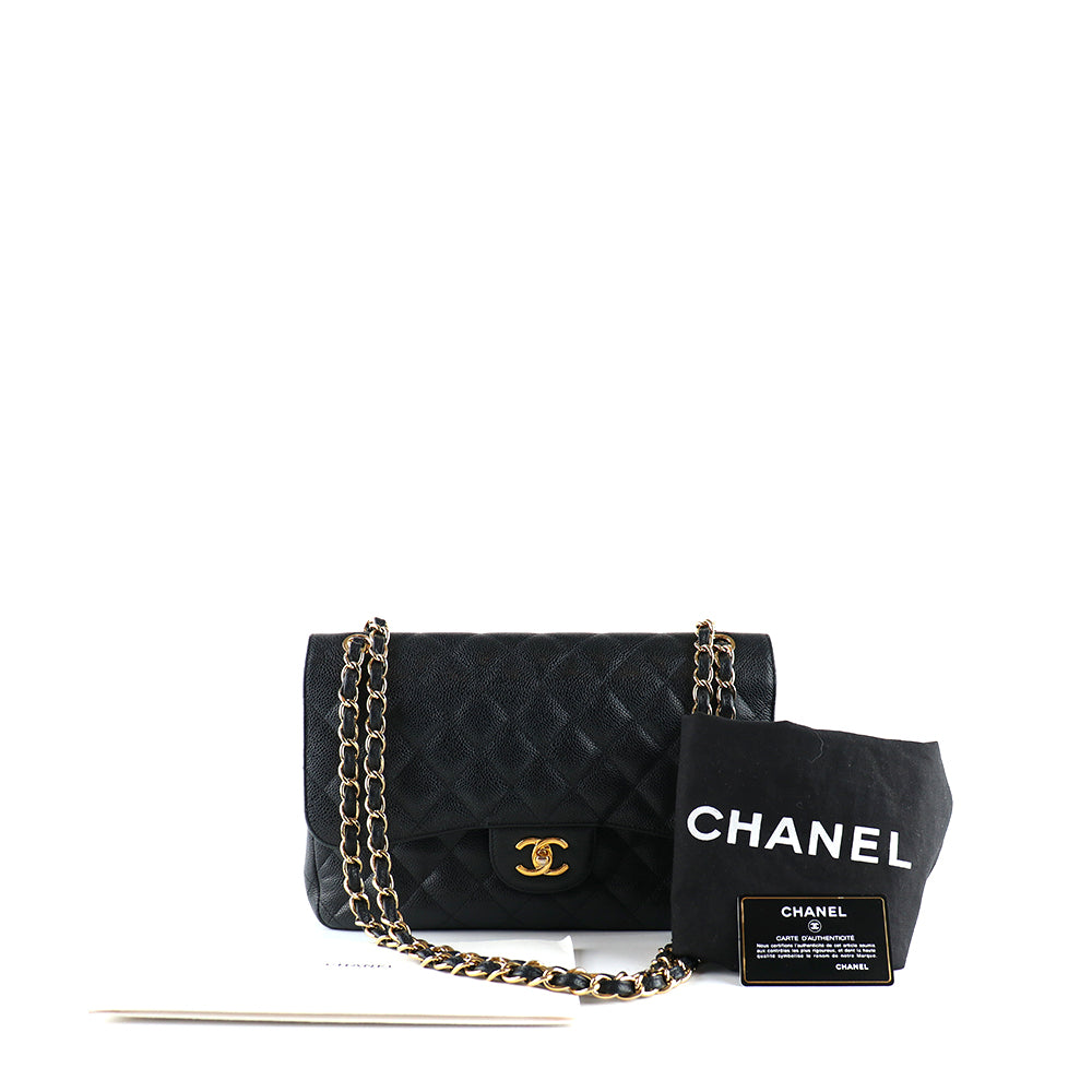 CHANEL - Sac à bandoulière Classique / Timeless Jumbo double flap en cuir caviar noir