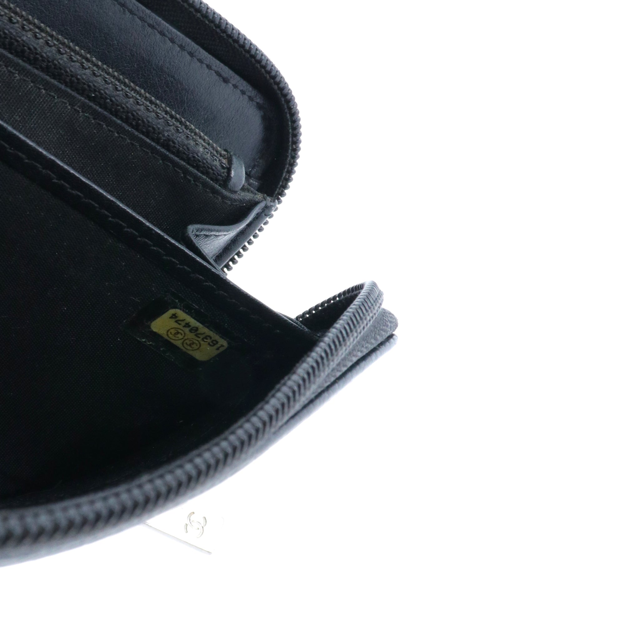 CHANEL - Black quilted leather wallet