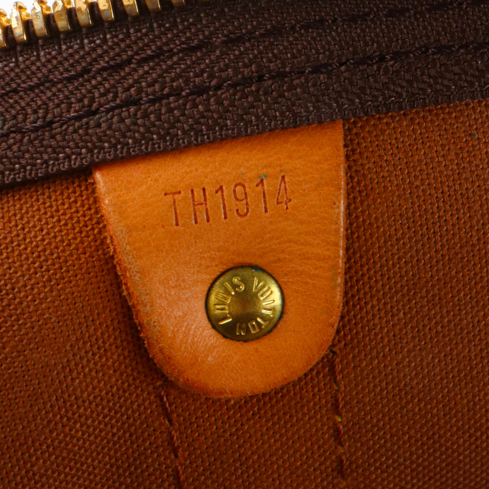 LOUIS VUITTON - Sac de voyage Keepall 55 à bandoulière en toile monogrammée vintage