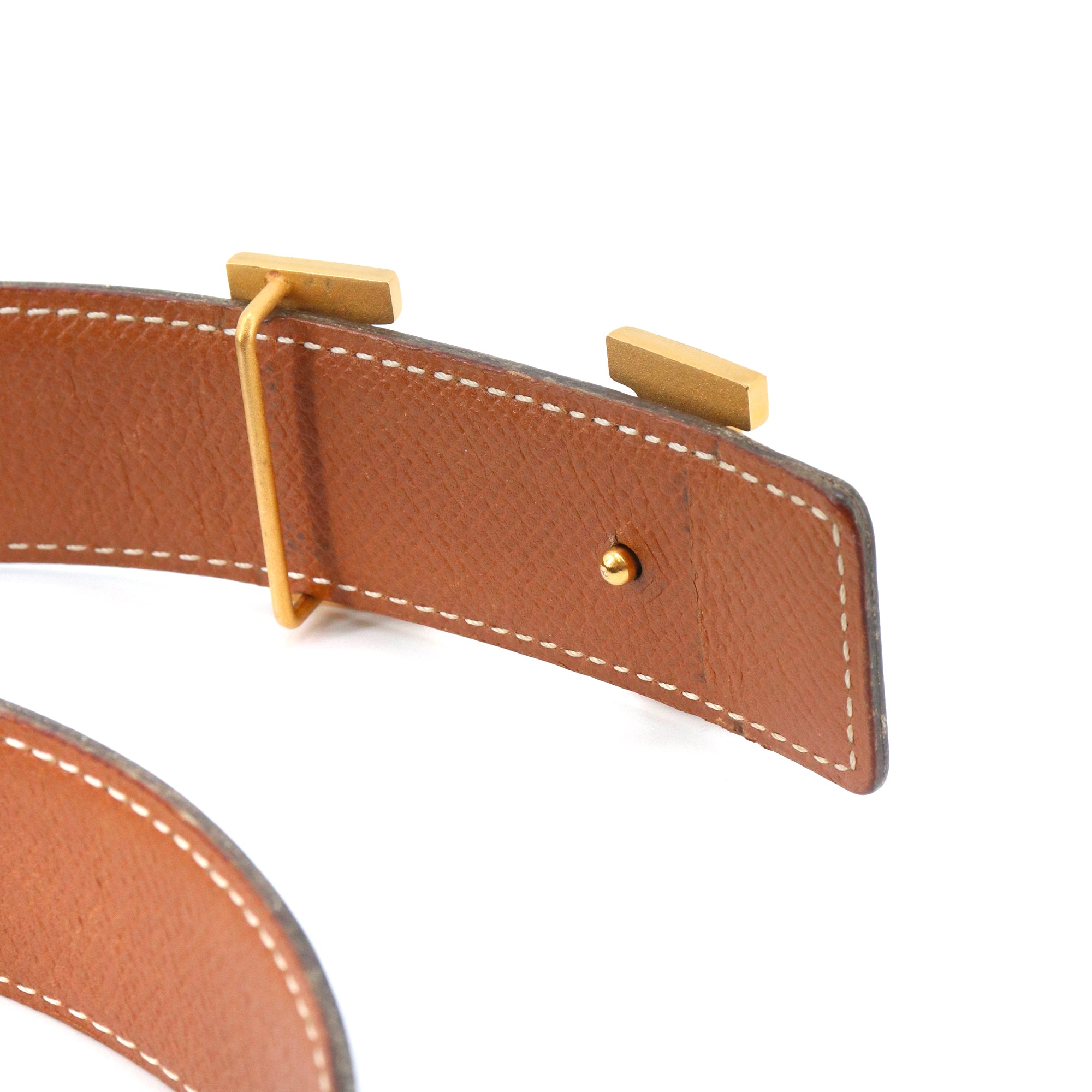 HERMÈS - Hermès reversible H belt in black and gold leather (T70)