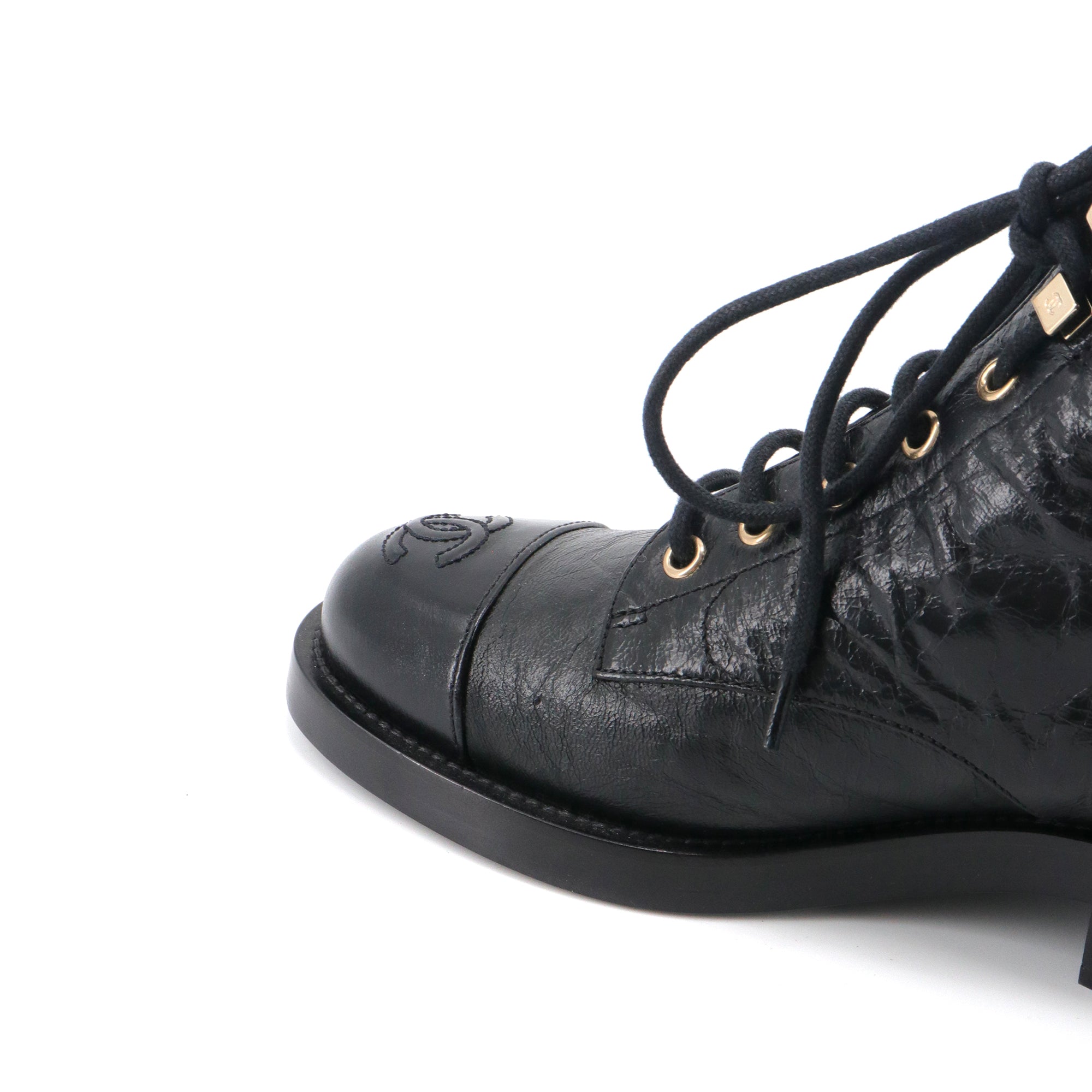 CHANEL - Chanel black leather ankle boots (size 37.5)